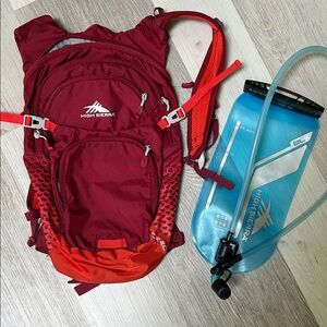 High Sierra Red and Orange Backpack with Blue Hydration Pack